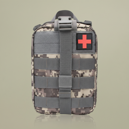 First aid kit with sandy grey beige-green background